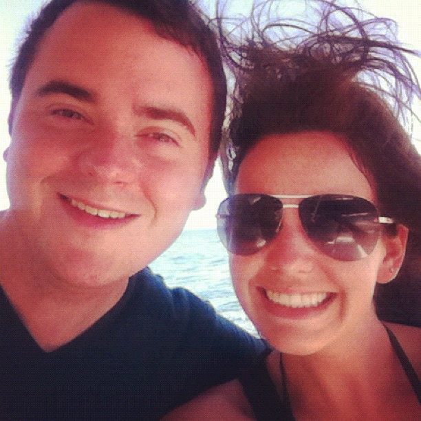 making strong attempts not to fly off the boat