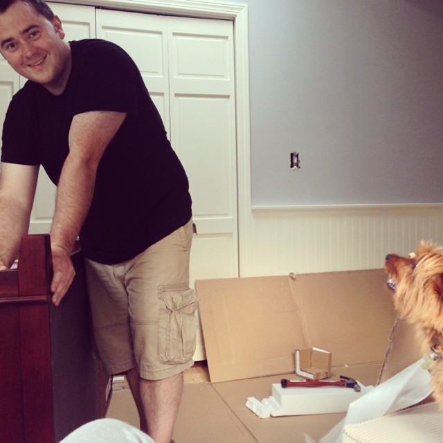 my handsome husband asked me to marry him two years ago today and now I get to watch him put together b's nursery furniture. with gracie's supervision, of course.  love this view