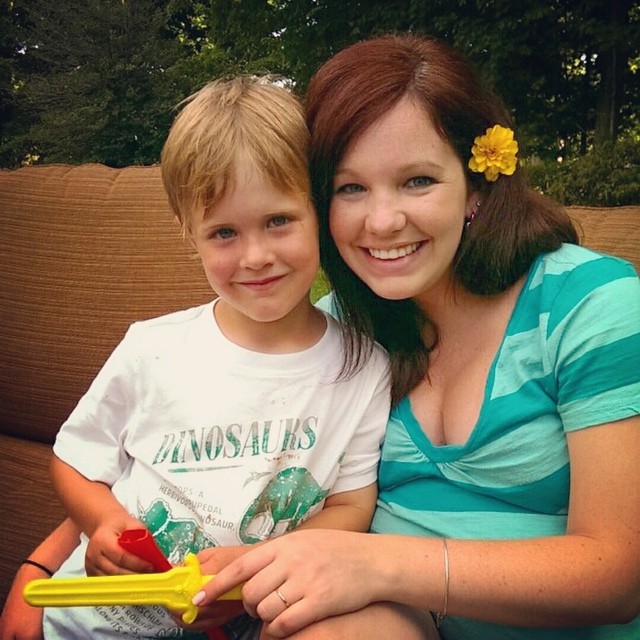 love this cutie...and my birthday presents from him (a flower from our yard and a sword)